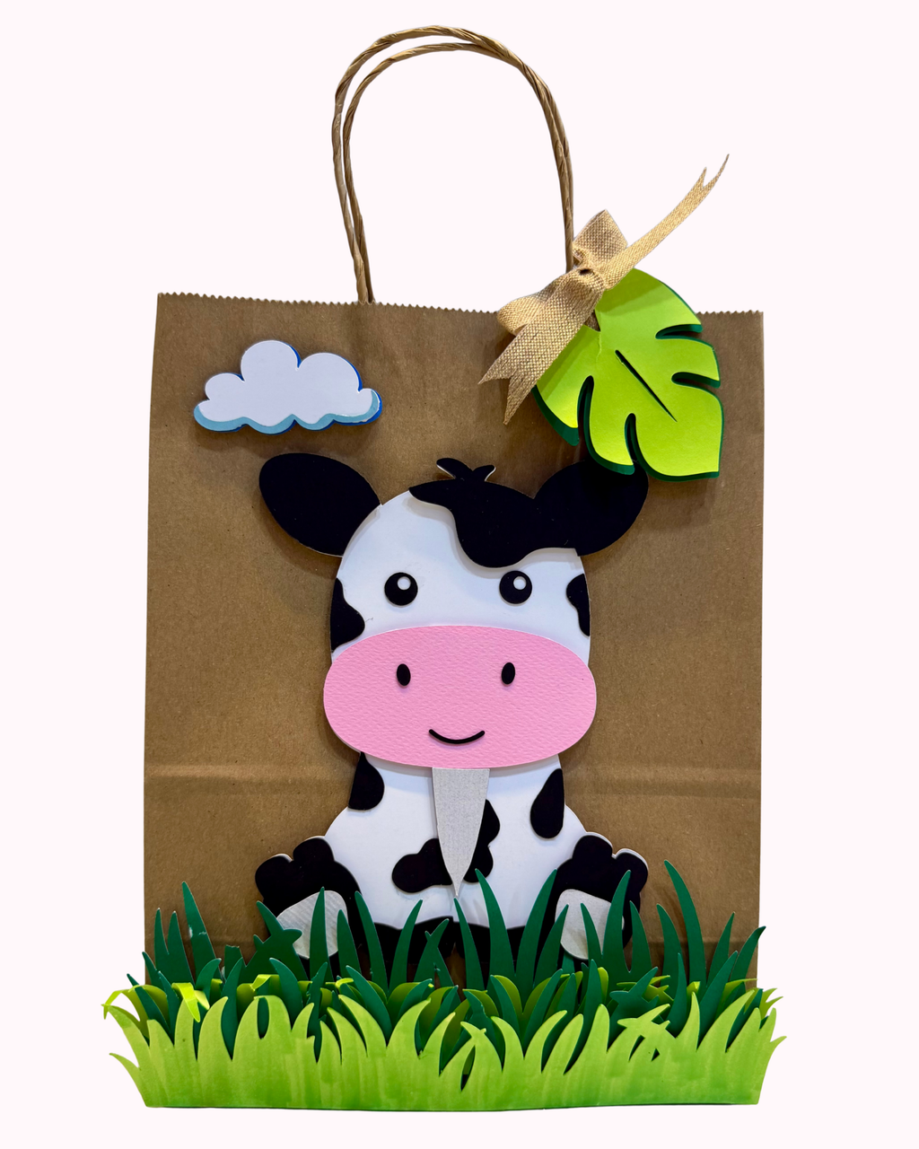 Safari favour bag with layered tropical leaves and animals – jungle birthday party return gift